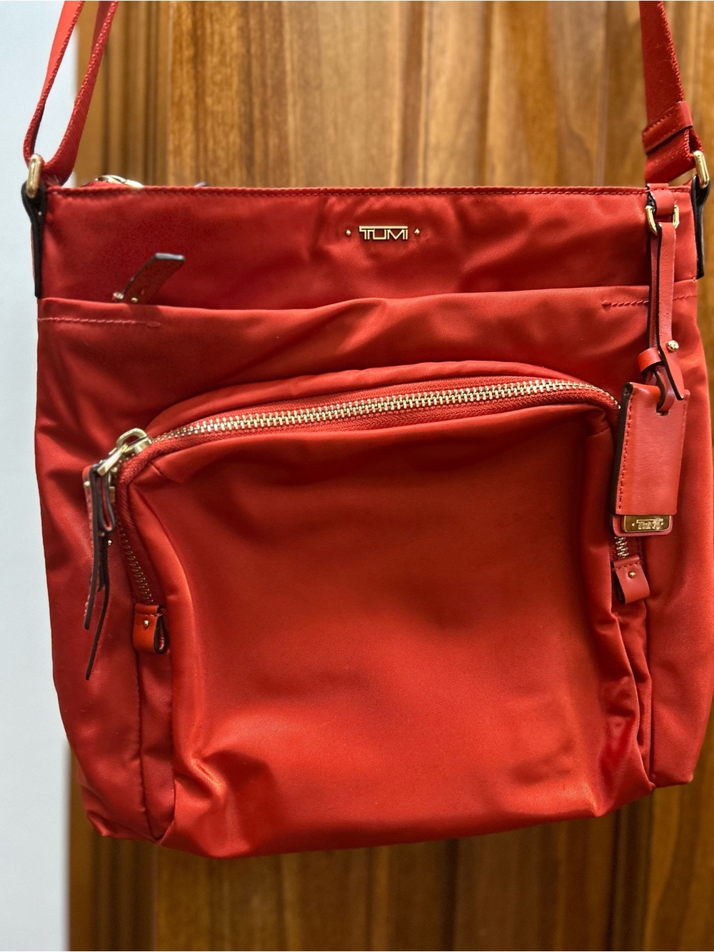 Tumi Red Nylon Crossbody with Gold Hardware
